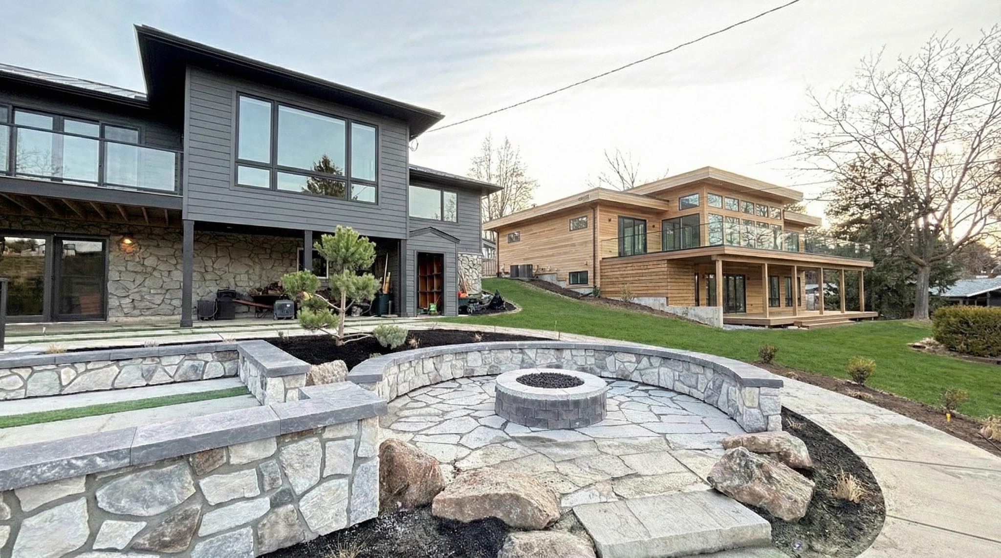 Stone patio with fire pit and retaining walls in Boise Idaho