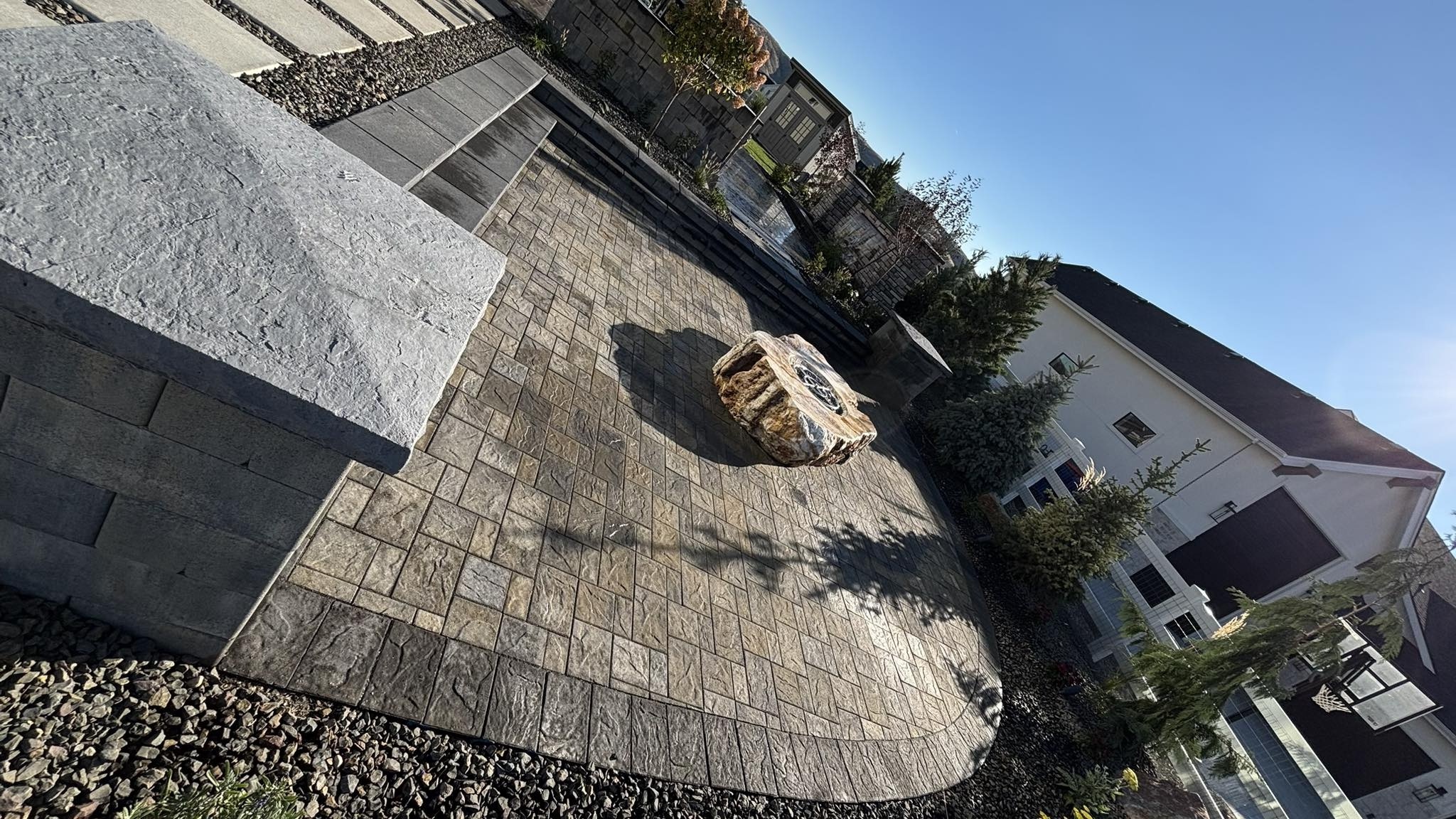 Paver patio installation with landscaping in Caldwell Idaho